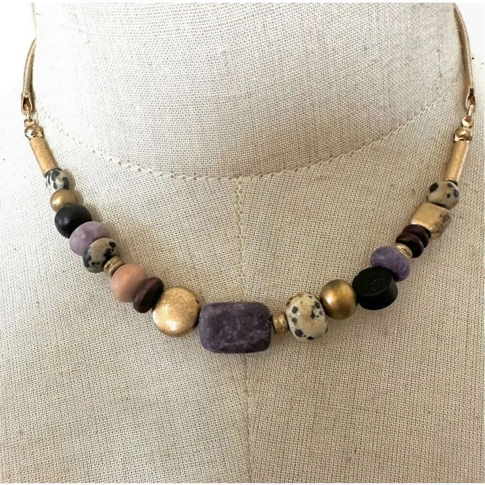 Gold tone purple beaded necklace